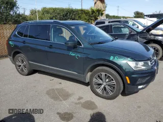 2018 Volkswagen Tiguan SEL with VIN 3VV3B7AX8JM051483, listed as a Copart auction lot 50076645 with 156,356 mi miles and Salvage Title. Bid and sale history available at DreamBid. Image 4.