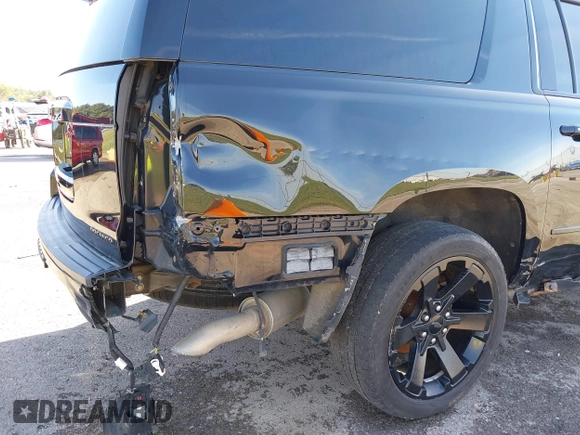 2019 Chevrolet Suburban Premier with VIN 1GNSKJKJ1KR100936, listed as a IAAI auction lot 40489121 with 97,884 mi miles and . Bid and sale history available at DreamBid. Image 20.