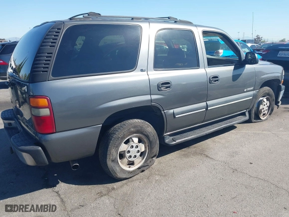 2002 Chevrolet Tahoe LT with VIN 1GNEC13ZX2R224413, listed as a IAAI auction lot 41818623 with 157,509 mi miles. Bid and sale history available at carsss.com. Image 4.