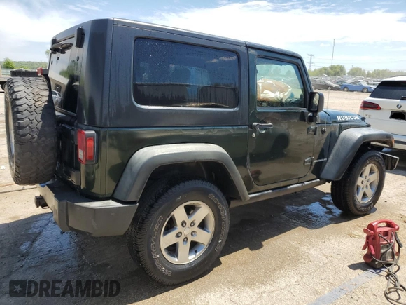 2010 Jeep Wrangler Rubicon with VIN 1J4BA6D12AL221220, listed as a Copart auction lot 56057055 with 200,346 mi miles and Salvage title. Bid and sale history available at DreamBid. Image 3.