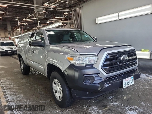 2019 Toyota Tacoma SR with VIN 5TFRX5GN1KX143485, listed as a IAAI auction lot 42763045 with 90,847 mi miles and . Bid and sale history available at DreamBid. Image 14.