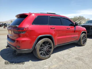2019 Jeep Grand Cherokee Trailhawk with VIN 1C4RJFLT4KC787940, listed as a Copart auction lot 60883895 with 77,160 mi miles and Salvage title. Bid and sale history available at DreamBid. Image 3.