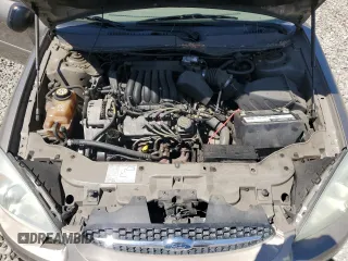 2003 Ford Taurus LX Standard z VIN 1FAFP52U63G277370, wystawiony jako Copart lot #56184345 z przebiegiem 115 778 mil mil oraz Szkoda całkowita • Salvage title. Historia ofert i sprzedaży dostępna na DreamBid. Obrazek 11.