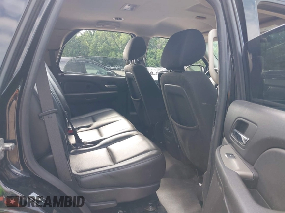 2010 Chevrolet Tahoe LS with VIN 1GNMCAE00AR175361, listed as a IAAI auction lot 42573822 with 188,700 mi miles and . Bid and sale history available at DreamBid. Image 8.