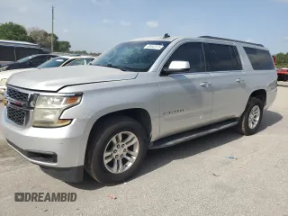 2015 Chevrolet Suburban LS z VIN 1GNSCHKC7FR120590, wystawiony jako Copart lot #60042815 z przebiegiem 183 407 mil mil oraz Czysty tytuł • Clean title. Historia ofert i sprzedaży dostępna na DreamBid. Obrazek 1.