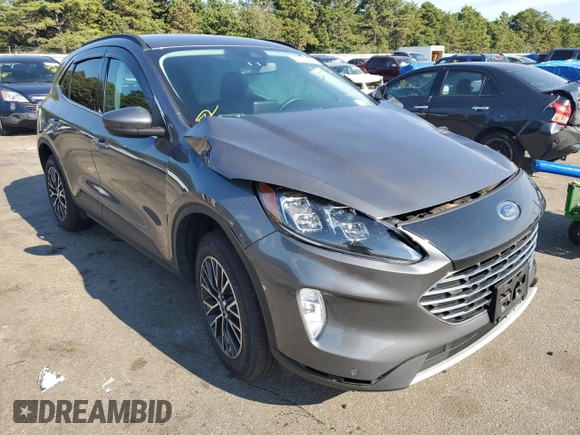 2021 Ford Escape Titanium Plug-In Hybrid z VIN 1FMCU0LZ1MUB17737, wystawiony jako Copart lot #57162592 z przebiegiem Nie podano mil oraz . Historia ofert i sprzedaży dostępna na DreamBid. Obrazek 1.