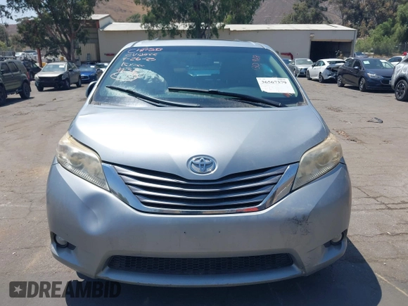 2015 Toyota Sienna XLE with VIN 5TDYK3DC0FS589947, listed as a IAAI auction lot 36567379 with 130,969 mi miles and . Bid and sale history available at DreamBid. Image 13.