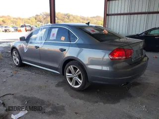 2014 Volkswagen Passat SE z VIN 1VWBN7A32EC059503, wystawiony jako IAAI lot #40876045 z przebiegiem Nie podano mil oraz . Historia ofert i sprzedaży dostępna na DreamBid. Obrazek 3.