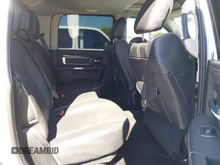 2015 Ram 1500 Laramie Longhorn z VIN 1C6RR7PM0FS508634, wystawiony jako IAAI lot #42125870 z przebiegiem Nie podano mil oraz . Historia ofert i sprzedaży dostępna na DreamBid. Obrazek 8.