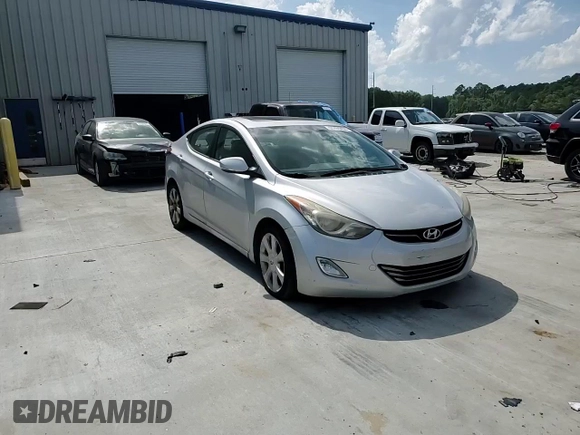2012 Hyundai Elantra GLS z VIN KMHDH4AE3CU258954, wystawiony jako Copart lot #57435455 z przebiegiem 177 657 mil mil oraz Szkoda całkowita • Salvage title. Historia ofert i sprzedaży dostępna na DreamBid. Obrazek 13.