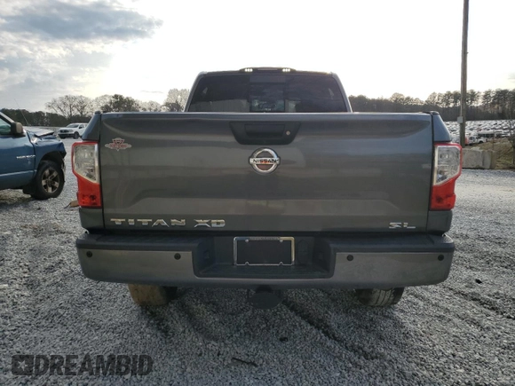 2016 Nissan Titan SL z VIN 1N6BA1F29GN515240, wystawiony jako Copart lot #45185835 z przebiegiem 137 164 mil mil oraz Czysty tytuł • Clean title. Historia ofert i sprzedaży dostępna na DreamBid. Obrazek 6.