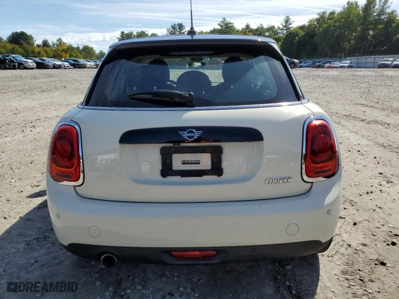 2019 MINI Hardtop 4 Door Cooper with VIN WMWXU1C56K2H74308, listed as a Copart auction lot 73110974 with 76,307 mi miles and Salvage Title. Bid and sale history available at carsss.com. Image 6.