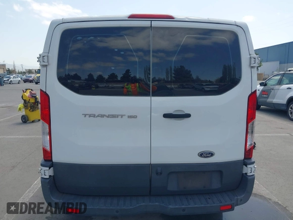 2016 Ford Transit Cargo with VIN 1FTYE1YM6GKB51876, listed as a IAAI auction lot 42009817 with 139,446 mi miles. Bid and sale history available at carsss.com. Image 16.