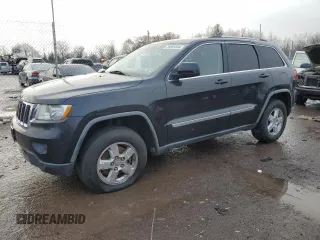 2011 Jeep Grand Cherokee Laredo with VIN 1J4RS4GG8BC508482, listed as a Copart auction lot 79261304 with 208,265 mi miles and Salvage Title. Bid and sale history available at DreamBid. Image 1.