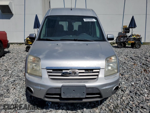 2013 Ford Transit Connect XLT with VIN NM0KS9BN1DT158199, listed as a Copart auction lot 56930665 with 191,534 mi miles and Salvage title. Bid and sale history available at DreamBid. Image 5.