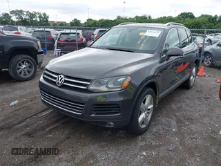 2012 Volkswagen Touareg Sport with VIN WVGFK9BP0CD002939, listed as a IAAI auction lot 42531654 with 222,435 mi miles and . Bid and sale history available at DreamBid. Image 17.