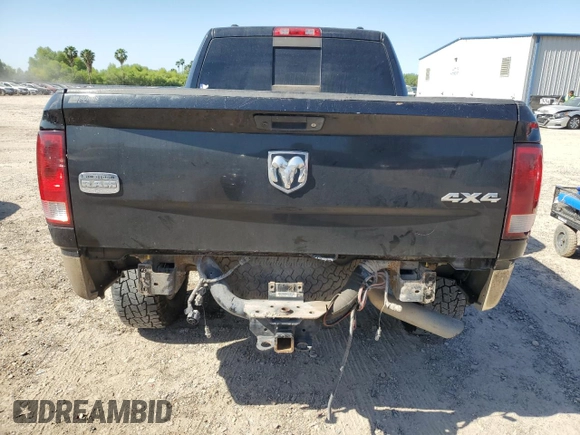 2011 Ram 2500 Laramie Longhorn z VIN 3D7UT2CLXBG604668, wystawiony jako Copart lot #52128635 z przebiegiem 479 971 mil mil oraz Szkoda całkowita • Salvage title. Historia ofert i sprzedaży dostępna na DreamBid. Obrazek 6.