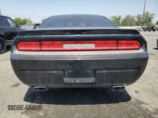 2014 Dodge Challenger R/T Plus z VIN 2C3CDYBT1EH294121, wystawiony jako Copart lot #60687575 z przebiegiem 121 607 mil mil oraz Szkoda całkowita • Salvage title. Historia ofert i sprzedaży dostępna na DreamBid. Obrazek 6.