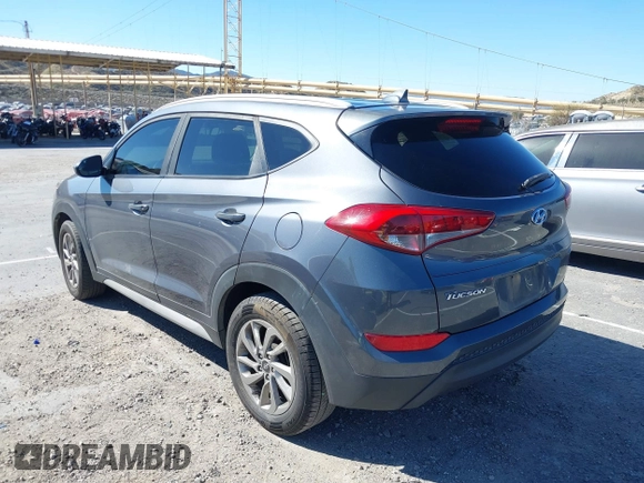 2018 Hyundai Tucson SEL with VIN KM8J3CA42JU618764, listed as a IAAI auction lot 41677046 with 127,980 mi miles. Bid and sale history available at carsss.com. Image 3.