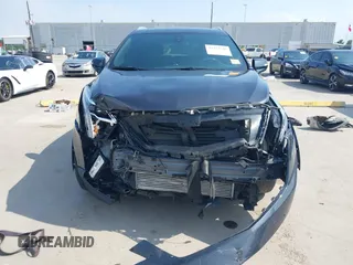 2023 Cadillac XT5 FWD Luxury с VIN 1GYKNAR40PZ193854, выставлен на аукционе IAAI как лот 42422246 с пробегом 26 053 миль миль и . История ставок и продаж доступна на DreamBid. Изображение 13.