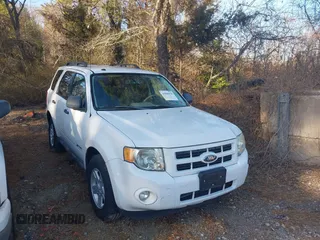 2009 Ford Escape Hybrid with VIN 1FMCU59309KA42631, listed as a IAAI auction lot 41809054 with 140,696 mi miles and . Bid and sale history available at DreamBid. Image 1.