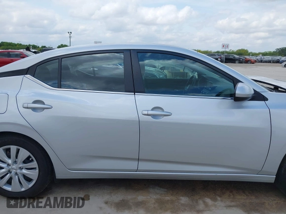 2023 Nissan Sentra S z VIN 3N1AB8BV7PY311515, wystawiony jako IAAI lot #42038589 z przebiegiem 13 907 mil mil oraz . Historia ofert i sprzedaży dostępna na DreamBid. Obrazek 14.