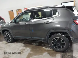 2019 Jeep Compass Trailhawk with VIN 3C4NJDDB2KT649889, listed as a IAAI auction lot 41562599 with 70,700 mi miles and . Bid and sale history available at carsss.com. Image 14.