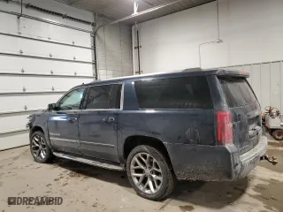 2017 Chevrolet Suburban Premier with VIN 1GNSKJKC8HR199992, listed as a Copart auction lot 45502355 with 219,534 mi miles and Salvage Title. Bid and sale history available at carsss.com. Image 2.