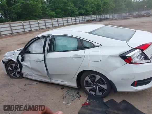2020 Honda Civic LX z VIN 19XFC2F66LE021813, wystawiony jako IAAI lot #42285033 z przebiegiem 116 069 mil mil oraz . Historia ofert i sprzedaży dostępna na DreamBid. Obrazek 14.