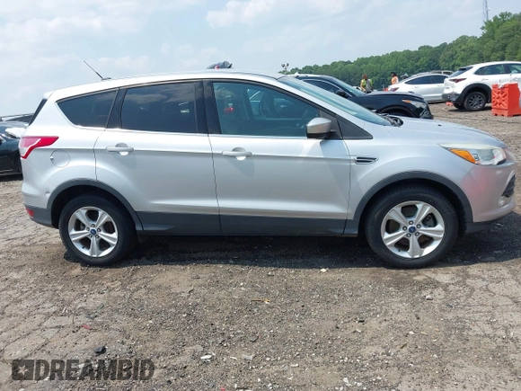 2013 Ford Escape SE z VIN 1FMCU9GX9DUB09981, wystawiony jako IAAI lot #42412927 z przebiegiem 150 499 mil mil oraz . Historia ofert i sprzedaży dostępna na DreamBid. Obrazek 13.
