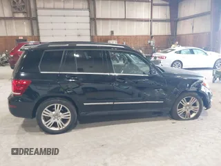 2015 Mercedes-Benz GLK with VIN WDCGG8JB0FG364079, listed as a IAAI auction lot 42096003 with 113,571 mi miles. Bid and sale history available at carsss.com. Image 13.