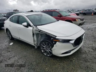 2019 Mazda 3 Premium with VIN 3MZBPAEM7KM102267, listed as a Copart auction lot 84275934 with 49,316 mi miles and Salvage Title. Bid and sale history available at DreamBid. Image 4.