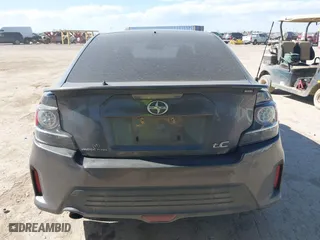 2014 Scion tC with VIN JTKJF5C74E3085237, listed as a IAAI auction lot 41788862 with 106,807 mi miles. Bid and sale history available at carsss.com. Image 17.