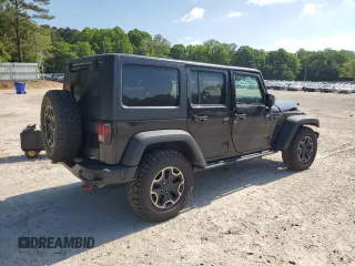 2016 Jeep Wrangler Unlimited Rubicon Hard Rock z VIN 1C4BJWFG6GL125252, wystawiony jako Copart lot #55241115 z przebiegiem 193 554 mil mil oraz Szkoda całkowita • Salvage title. Historia ofert i sprzedaży dostępna na DreamBid. Obrazek 3.