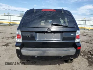 2009 Mercury Mariner Premier z VIN 4M2CU97G69KJ04108, wystawiony jako Copart lot #56217925 z przebiegiem Nie podano mil oraz Szkoda całkowita • Salvage title. Historia ofert i sprzedaży dostępna na DreamBid. Obrazek 6.