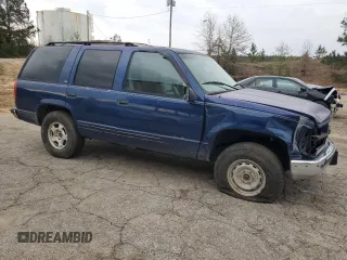 1998 GMC Yukon with VIN 1GKEK13R5WR514208, listed as a Copart auction lot 49724615 with 260,788 mi miles and Salvage Title. Bid and sale history available at carsss.com. Image 4.