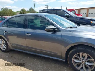 2018 Volkswagen Passat S z VIN 1VWAA7A32JC022159, wystawiony jako IAAI lot #41988875 z przebiegiem 121 598 mil mil oraz . Historia ofert i sprzedaży dostępna na DreamBid. Obrazek 13.