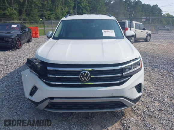2023 Volkswagen Atlas SE z VIN 1V2WR2CA6PC547040, wystawiony jako IAAI lot #42400535 z przebiegiem 25 300 mil mil oraz . Historia ofert i sprzedaży dostępna na DreamBid. Obrazek 12.