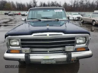 1987 Jeep Grand Wagoneer with VIN 1JCNJ15U7HT006097, listed as a Copart auction lot 89191925 with 119,168 mi miles and Salvage title. Bid and sale history available at DreamBid. Image 5.