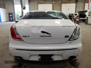 2014 Jaguar XJ Portfolio with VIN SAJWJ2GD2E8V69597, listed as a Copart auction lot 57798145 with 100,857 mi miles and Salvage title. Bid and sale history available at DreamBid. Image 6.