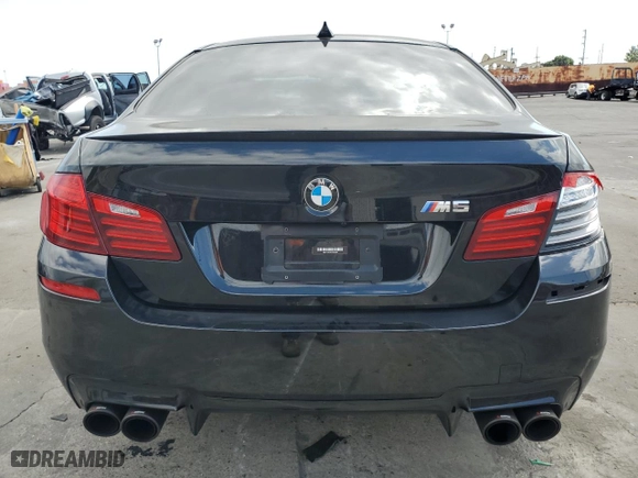 2015 BMW M5 with VIN WBSFV9C56FD594465, listed as a Copart auction lot 72085944 with 76,313 mi miles and Salvage Title. Bid and sale history available at carsss.com. Image 6.