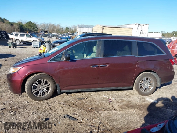 2012 Honda Odyssey EX-L with VIN 5FNRL5H60CB096691, listed as a IAAI auction lot 41824395 with 93,047 mi miles and . Bid and sale history available at DreamBid. Image 14.