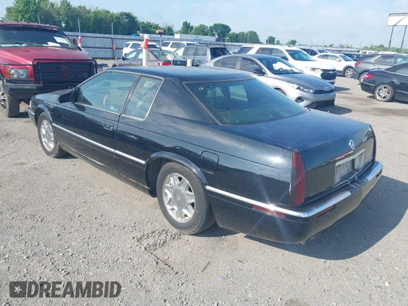 2002 Cadillac Eldorado ESC with VIN 1G6EL12YX2B105502, listed as a IAAI auction lot 42121952 with 110,261 mi miles. Bid and sale history available at carsss.com. Image 3.
