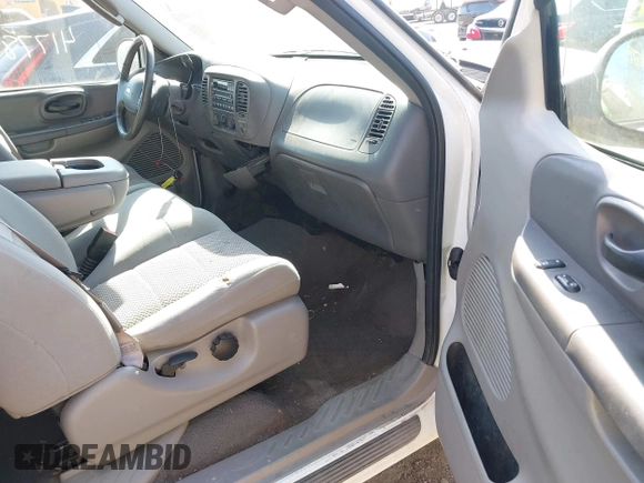 2003 Ford F-150 with VIN 2FTRX17L63CA31923, listed as a IAAI auction lot 41778818 with 107,600 mi miles and . Bid and sale history available at DreamBid. Image 5.