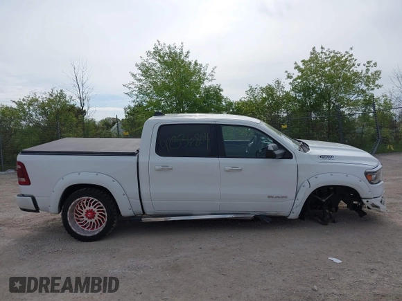 2019 Ram 1500 Big Horn z VIN 1C6SRFFT6KN660091, wystawiony jako IAAI lot #42336804 z przebiegiem 59 162 mil mil oraz . Historia ofert i sprzedaży dostępna na DreamBid. Obrazek 13.