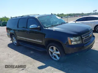 2011 Chevrolet Suburban LTZ with VIN 1GNSCKE01BR275919, listed as a IAAI auction lot 42038399 with 247,841 mi miles. Bid and sale history available at carsss.com. Image 1.