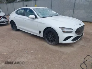 2023 Genesis G70 2.0T z VIN KMTG34TA7PU131917, wystawiony jako IAAI lot #42142928 z przebiegiem 32 158 mil mil oraz . Historia ofert i sprzedaży dostępna na DreamBid. Obrazek 1.