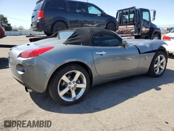 2007 Pontiac Solstice z VIN 1G2MB35B77Y113046, wystawiony jako Copart lot #52297605 z przebiegiem 35 658 mil mil oraz Szkoda całkowita • Salvage title. Historia ofert i sprzedaży dostępna na DreamBid. Obrazek 3.