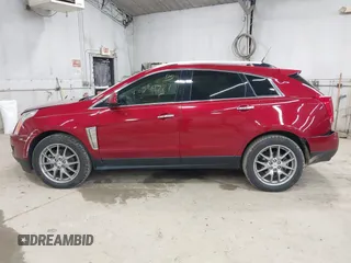 2014 Cadillac SRX Performance Collection z VIN 3GYFNCE30ES596415, wystawiony jako IAAI lot #42329771 z przebiegiem 71 620 mil mil oraz . Historia ofert i sprzedaży dostępna na DreamBid. Obrazek 14.