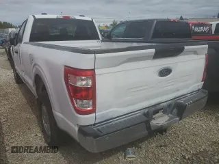 2021 Ford F-150 XL with VIN 1FTMF1EB4MKE11721, listed as a Copart auction lot 65990284 with Not provided miles and Salvage title. Bid and sale history available at DreamBid. Image 2.